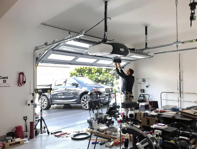 Lynnfield Garage Door Repair specialist installing smart garage door opener system in Lynnfield home