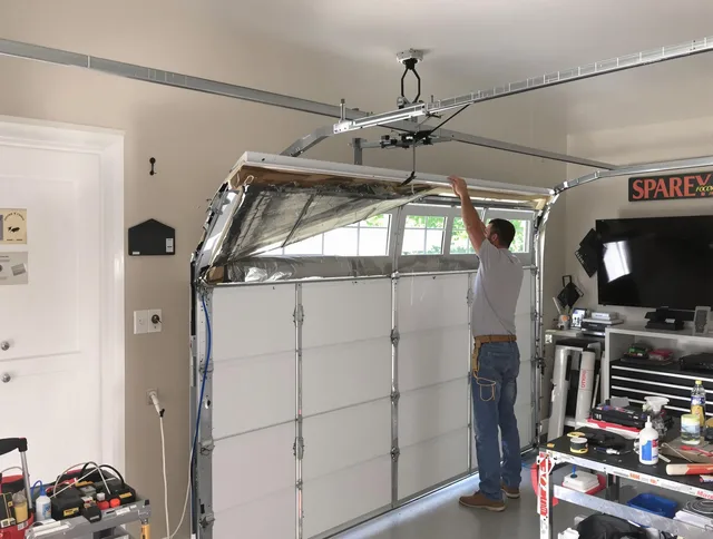 Garage door section replacement by Lynnfield Garage Door Repair in Lynnfield