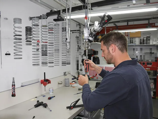 Lynnfield Garage Door Repair safety certified technician performing precision spring replacement in Lynnfield