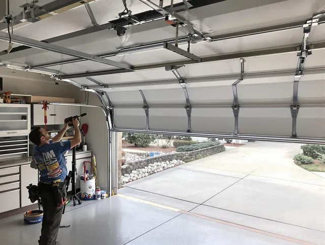 Garage door track repair service by Lynnfield Garage Door Repair in Lynnfield
